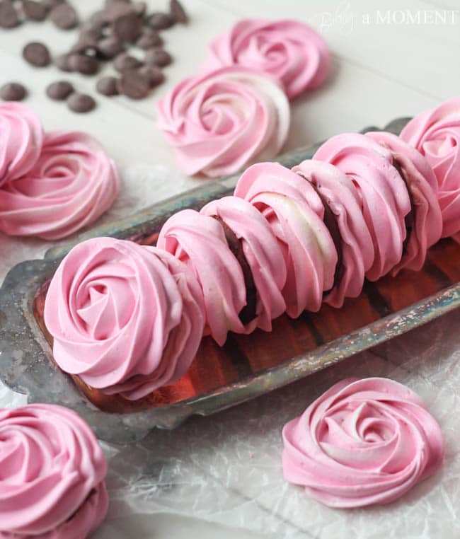Raspberry Meringues with Whipped Dark Chocolate Ganache Filling | Baking a Moment