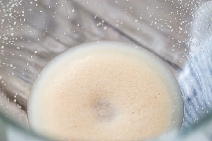 Foaming yeast in a glass bowl.