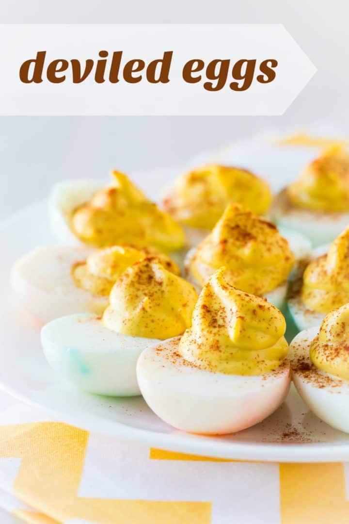 Best deviled eggs on a white plate with a text overlay reading "deviled eggs."