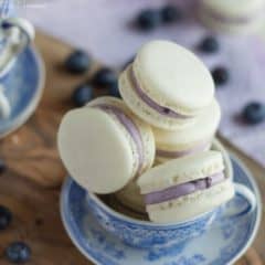 Delicate Almond French Macarons are Sandwiched with a Rich and Creamy Blueberry Mascarpone Filling. A Fresh way to enjoy Seasonal Summer Berries!