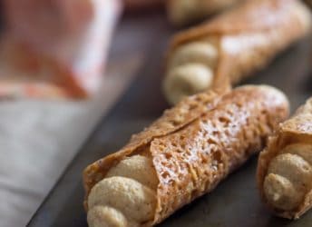 Such a fun Fall treat! Pumpkin Cannoli with a creamy, spiced filling & a nutty almond brittle shell