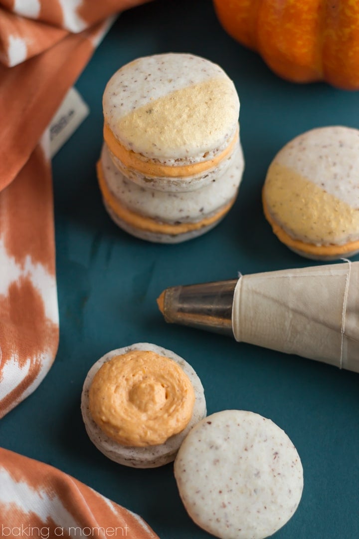 These make such a perfect little sweet nibble for a fall get-together.  Hazelnut macarons with maple pumpkin cream cheese filling-- amazing flavor! 