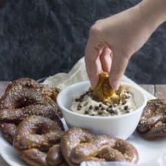 Homemade Soft Pretzels stuffed with Peanut Butter, served with a Malted Vanilla cream cheese Dip with Banana and Chocolate Chips. These Chubby Hubby Pretzels and Dip are totally outrageous! Perfect Superbowl dessert ;)