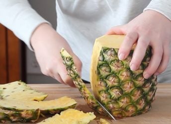 How to cut a whole fresh pineapple into bite-sized pieces in less than 4 minutes!