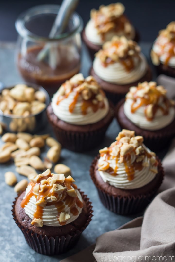 Snickers Cupcakes- best ever chocolate cupcake, topped with peanut butter buttercream, salted caramel, and peanuts. These were incredible! 