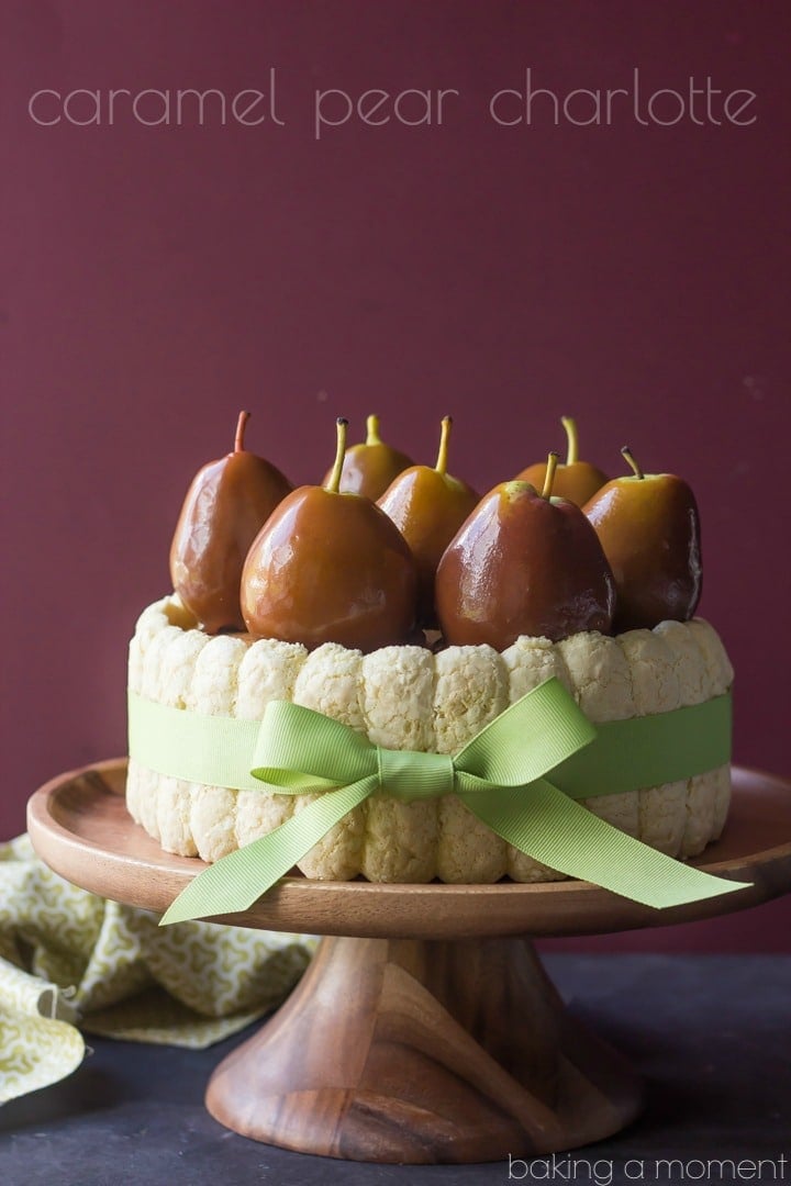 Pear Caramel Charlotte, by Baking a Moment: layers of vanilla brown sugar cake, sandwiched around a pear caramel mousse, surrounded by ladyfingers and crowned with caramel-dipped pears.