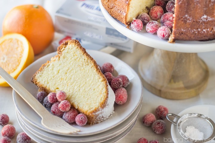 I LOVED the velvety texture of this cream cheese pound cake! The orange and spice is perfect for the holidays, and those sugared cranberries are so gorgeous! #oneandonlyphilly #holidaysaremadewith #spon @spreadphilly