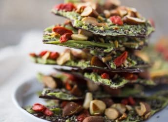 This Dark Chocolate Almond Superfood Bark is loaded with healthy ingredients like matcha, goji berries, and chia seeds. Makes a great homemade holiday gift!