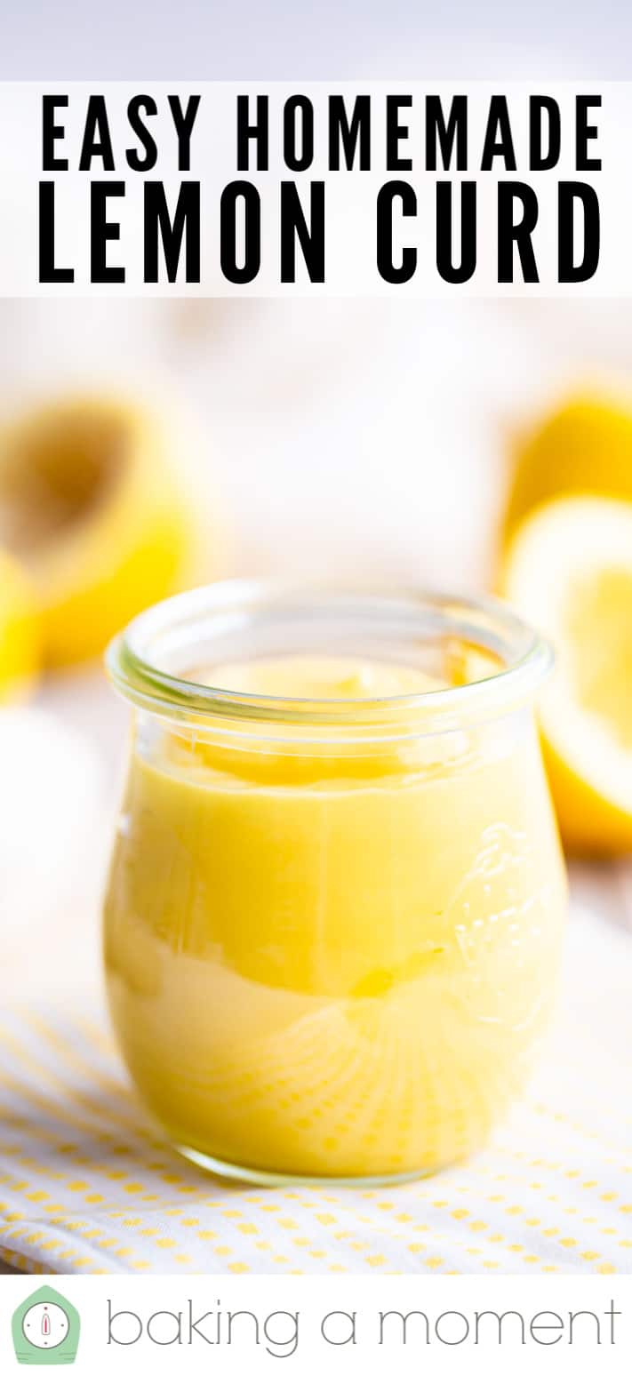 Bright yellow lemon curd in a jar with lemons in the background.