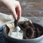 Baked Churros are such a fun treat! This version has crushed Oreo cookies running all throughout the batter, plus a thick crunchy crust of cookie crumbs on the outside too. Dunk them in this Easy Vanilla Creme dip for the full Cookies and Cream experience!