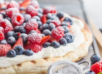 Such a great summer snack or dessert! This honey wheat flatbread whips up in a snap with no rise time, and the lightly sweet and fluffy whipped ricotta is so good with fresh berries!