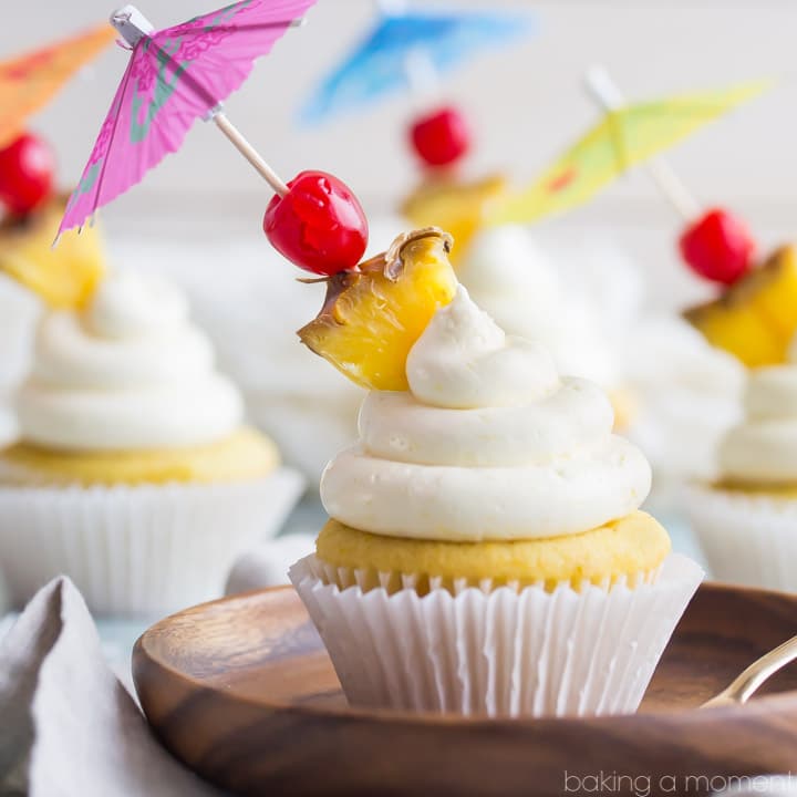 Pina Colada Cupcakes- just like my favorite tropical cocktail! The pineapple and coconut flavors really shine in this recipe :)