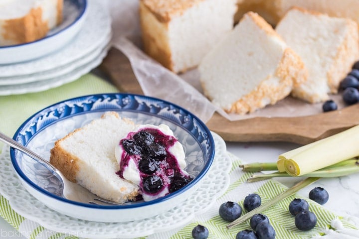 Classic Angel Food Cake: perfectly sweet & light as a cloud, served with fresh whipped cream and a citrus-y blueberry lemongrass topping. 