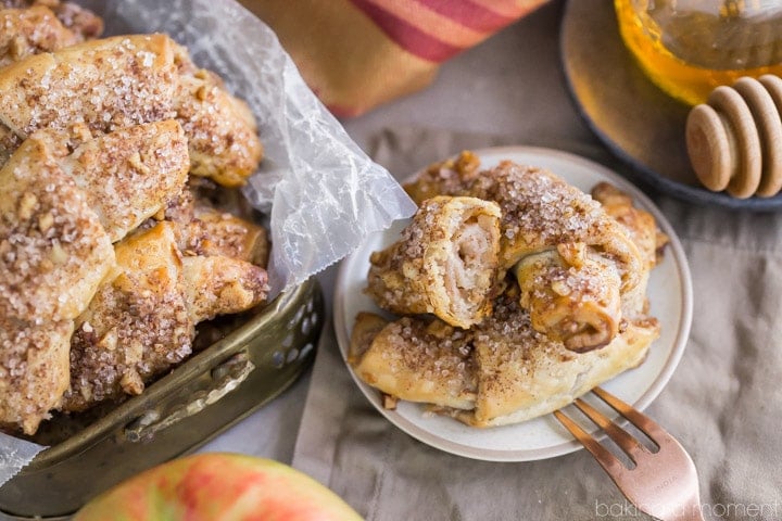 Apple Honey Rugelach: tender cream cheese pastries filled with charoset- an apple/honey/walnut mixture that's perfect for Rosh Hashana or any other fall occasion!