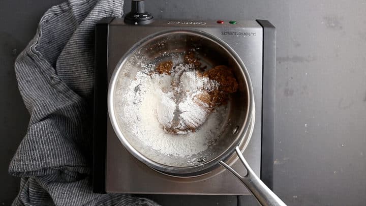 Brown sugar, cornstarch, and salt in a pot.