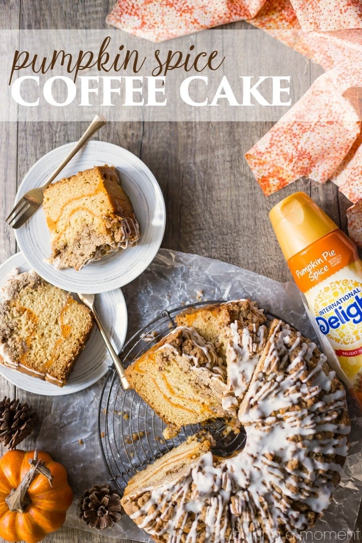 Pumpkin Spice Coffee Cake: moist sour cream coffee cake infused with pumpkin spice, ribboned with pumpkin and topped with a crunchy cinnamon crumb topping. Perfect for fall! food brunch cake#PumpkinDelight #IDelight @indelight #ad