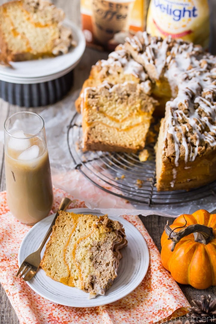 Pumpkin Spice Coffee Cake: moist sour cream coffee cake infused with pumpkin spice, ribboned with pumpkin and topped with a crunchy cinnamon crumb topping. Perfect for fall! food brunch cake #PumpkinDelight #IDelight @indelight #ad