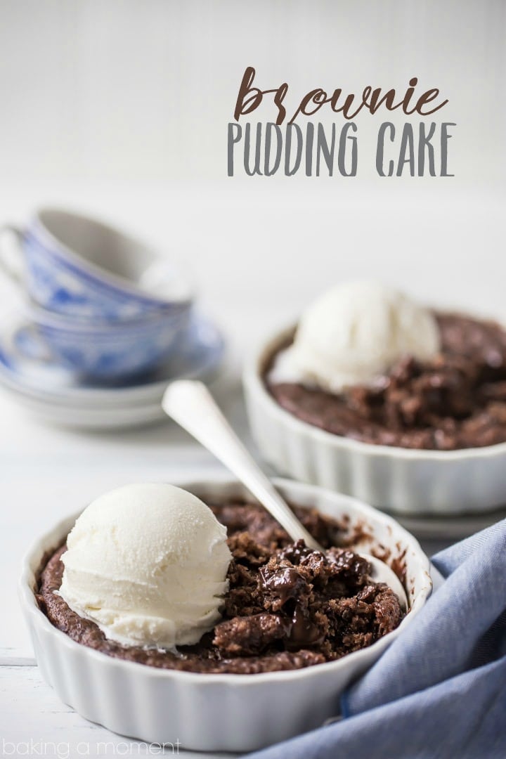 Brownie pudding cakes baked in individual dishes with ice cream on top.