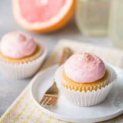 Grapefruit Champagne Mimosa Cupcakes: So light and fluffy, with a sweet, citrus-y zing and a gorgeous pink color! Perfect for New Years Eve or a girl's party. #BakeYourPassion #sponsored @whitelilyflour