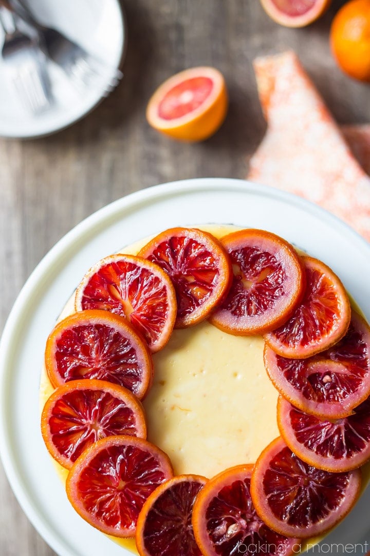 Blood Orange Cheesecake: the candied orange slices are so pretty and the citrus flavor works so well against the creamy cheesecake! The crunchy chocolate cookie crust is the perfect compliment. food desserts cheesecake