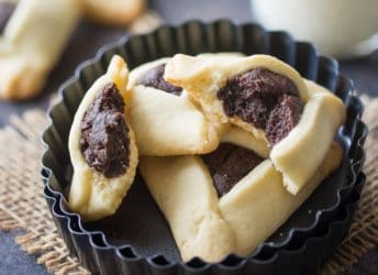 Fudge Brownie Hamantaschen- Little pillows of fudge-y chocolate brownie filling, surrounded by a butter-y sugar cookie. food recipes purim cookies