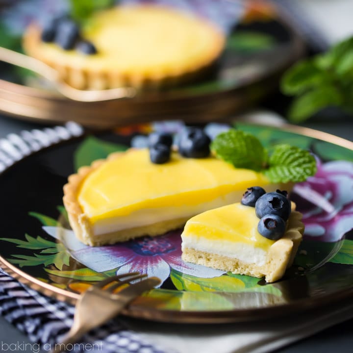Lemon Cheesecake Tarts: with a buttery shortbread crust, a fluffy no-bake cheesecake base, and tangy lemon curd. One of the best desserts I've ever had! food desserts lemon #ad @mackenziechilds