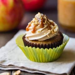 Caramel Apple Cupcakes: moist, subtly spiced apple cake topped with salted caramel buttercream, drizzled with caramel sauce and garnished with chopped peanuts. Just like the favorite fall treat, in cupcake form! food desserts apple