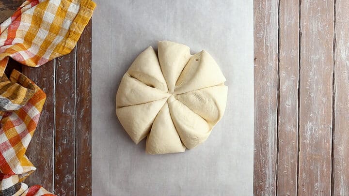Pretzel dough divided into 8 equal portions.