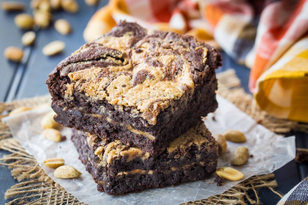 Horizontal image of peanut butter swirl chocolate fudge brownies made from scratch.