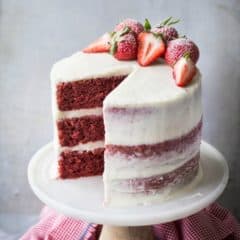 Southern-style red velvet layer cake with homemade cream cheese icing.