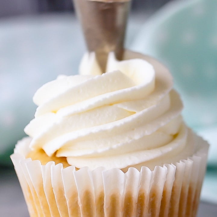 Whipped cream frosting: pipes well and can be made ahead! Perfect for cupcakes and cakes.