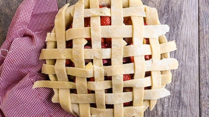 How to Make Lattice Pie Crust Step-by-Step: Woven crust to be trimmed.