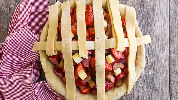 How to Make Lattice Pie Crust Step-by-Step: Folding up other vertical strips.