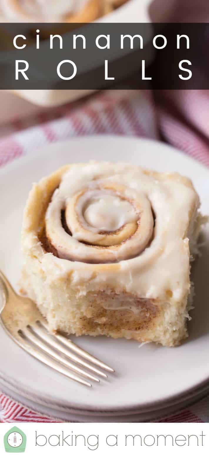 Close-up image of a gooey, fluffy, homemade cinnamon roll, with a text overlay reading "Cinnamon Rolls."