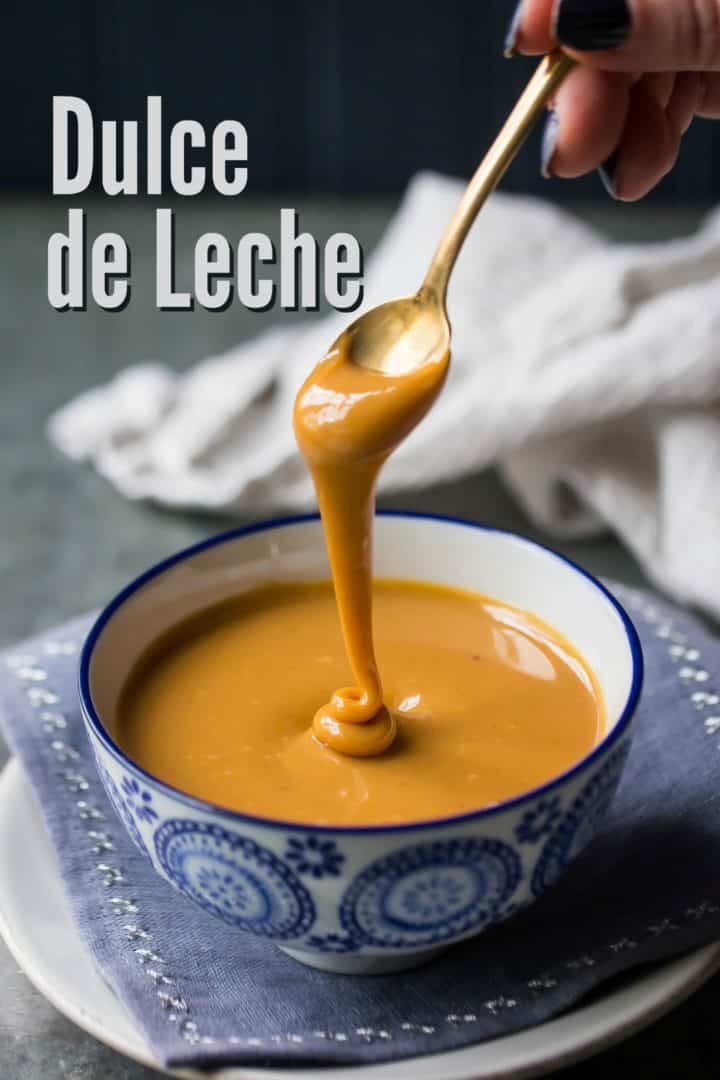Spooning dulce de leche from a bowl, with a text overlay reading "Dulce de Leche."