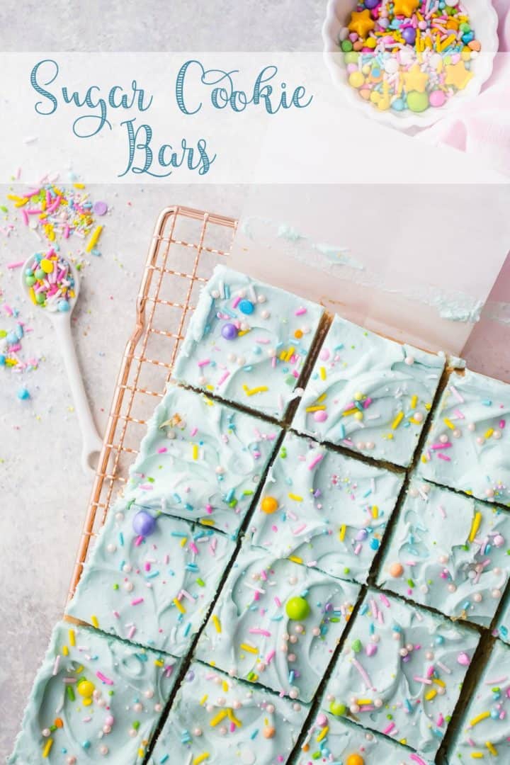 Overhead view of frosted soft sugar cookie bars with a text overlay reading "Sugar Cookie Bars."