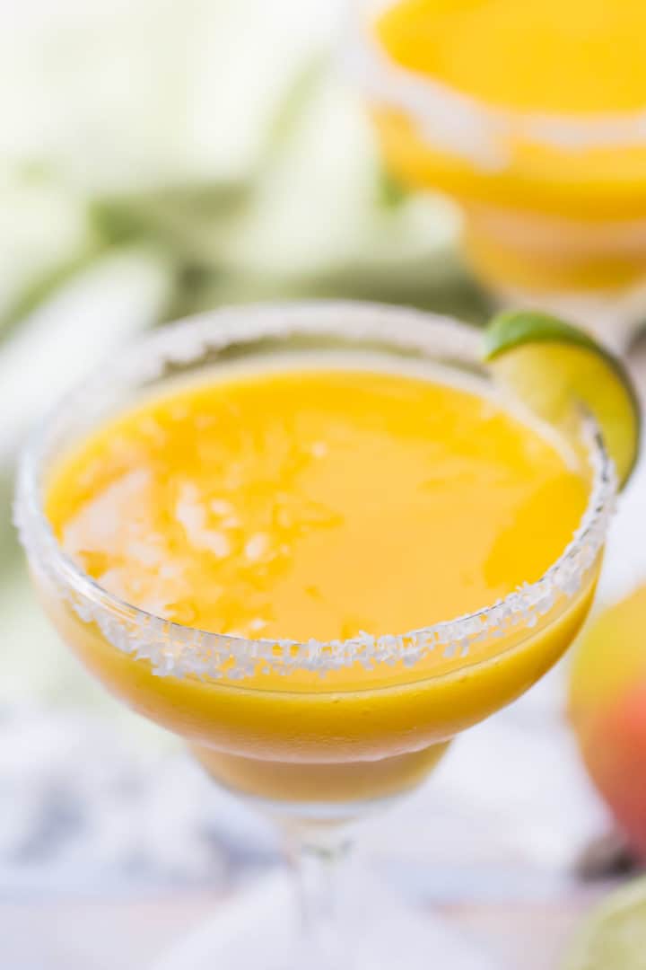 Close-up of frozen blended mango margaritas.
