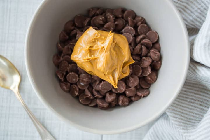 Bowl of chocolate chips and peanut butter.
