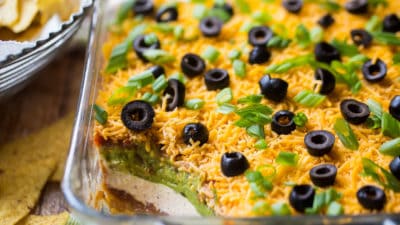 7-layer Mexican dip in a glass dish.