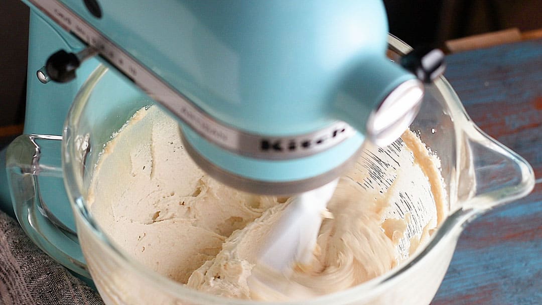 Creaming butter and sugar together in a stand mixer.
