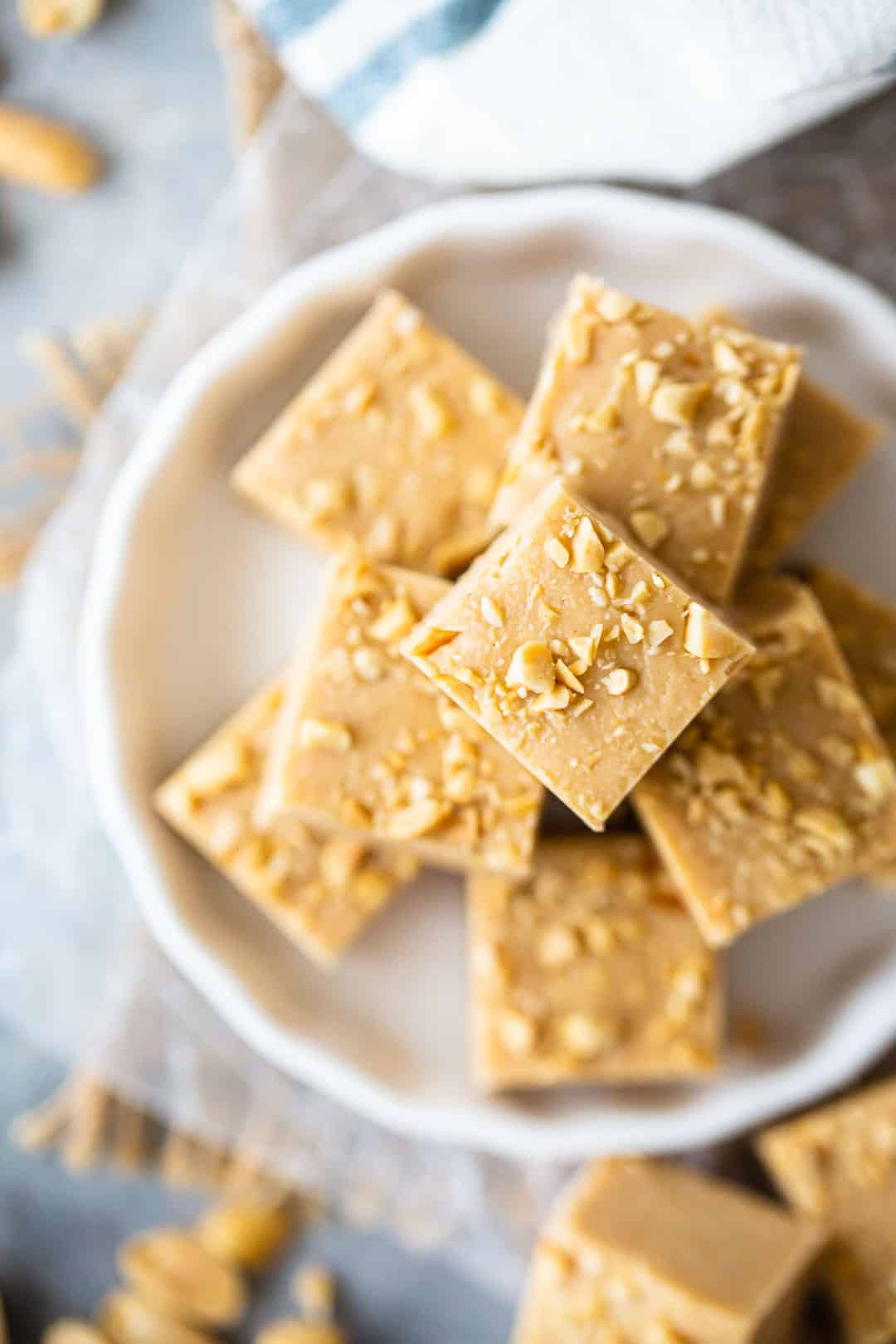 Overhead image of peanut butter fudge recipe prepared and cut into squares.