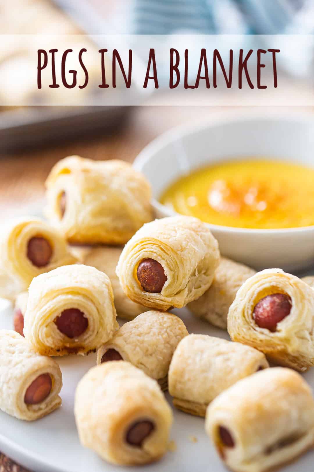 Pigs in a blanket recipe prepared from scratch with a text overlay above that reads "Pigs in a Blanket."