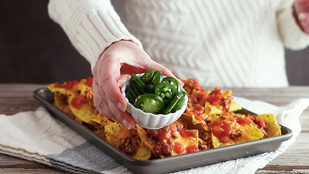 Freshly sliced jalapeno peppers for nacho recipe.