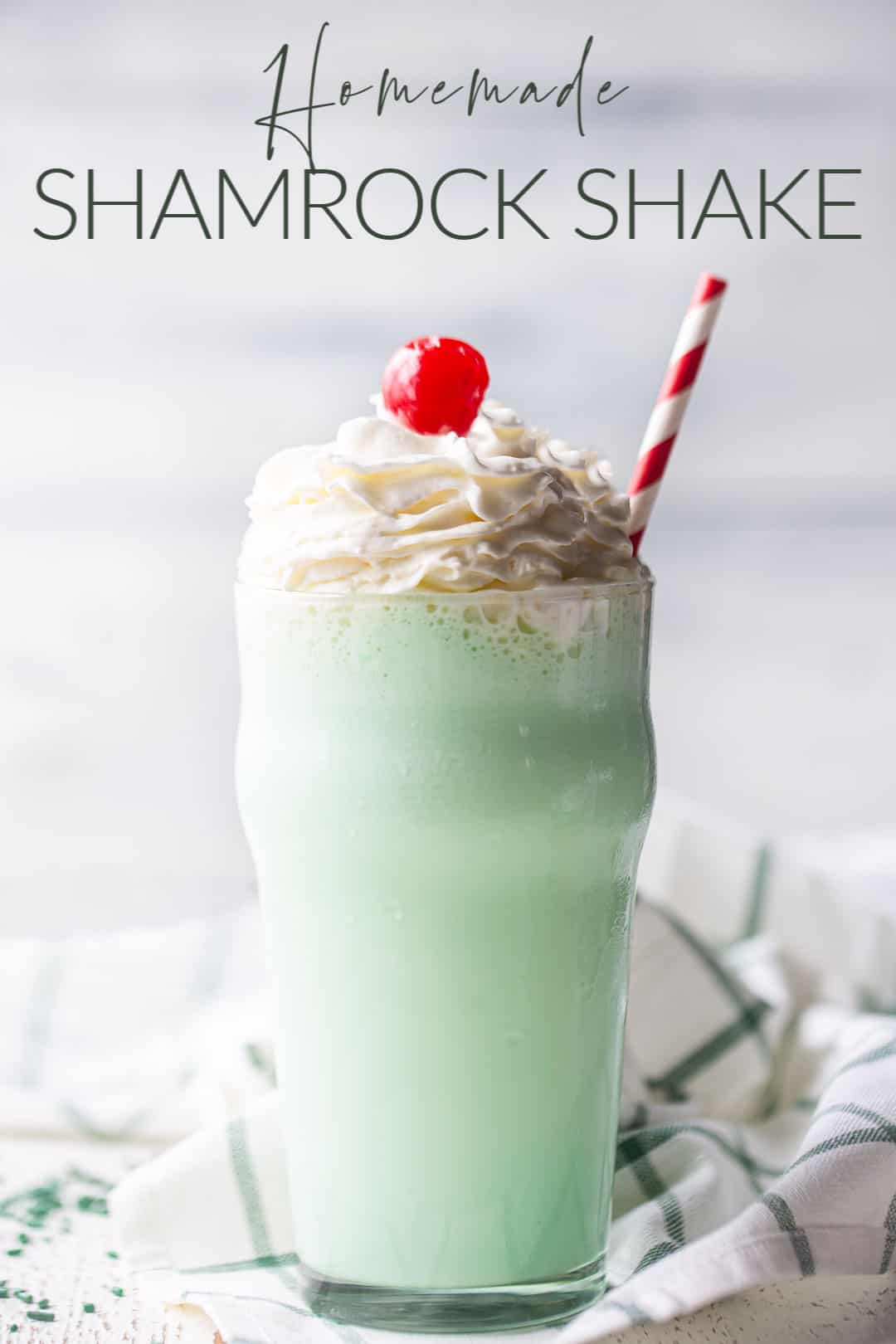 McDonald's shamrock shake copycat recipe prepared and served in a tall glass, with a text overlay above reading "Homemade Shamrock Shake."