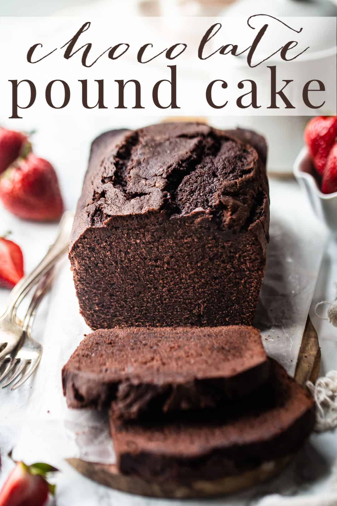 Chocolate pound cake recipe, baked in a loaf and served with fresh strawberries.