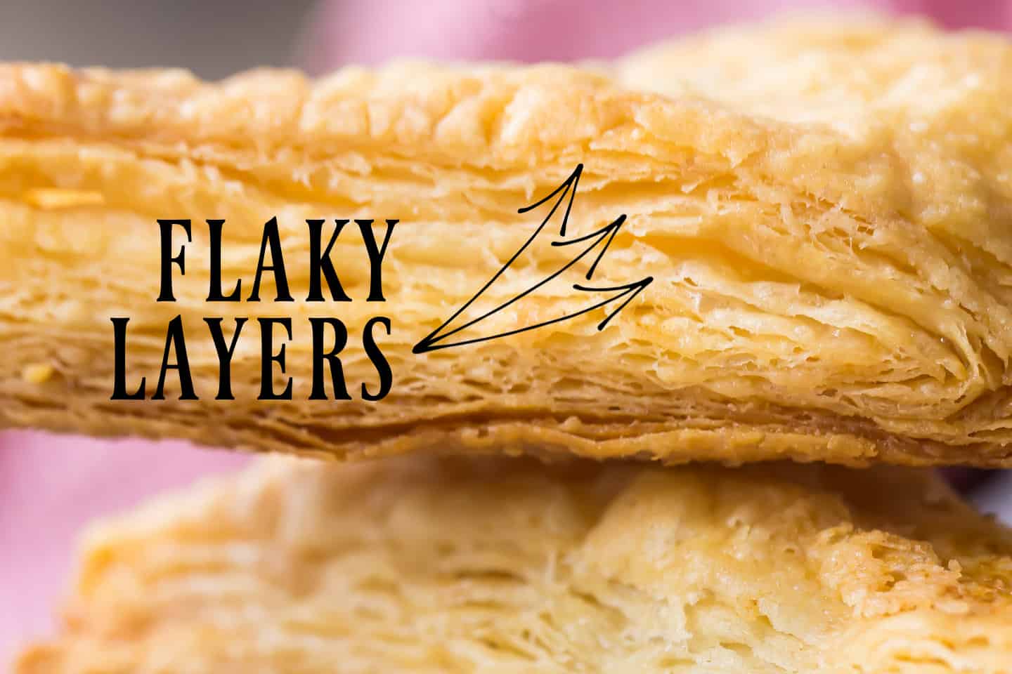 Close-up of puff pastry from the side, displaying the infinite number of flaky layers.