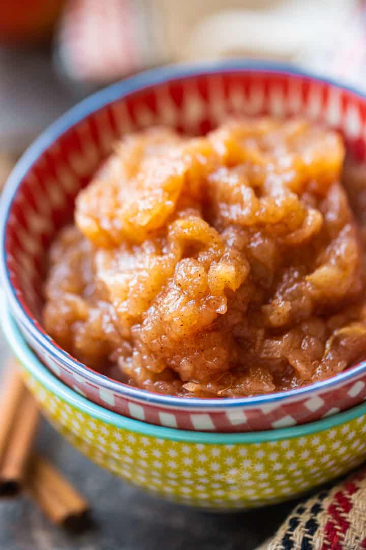 Close-up image of chunky homemade applesauce with cinnamon.