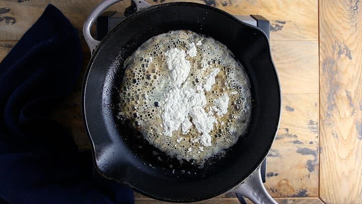 Making a roux with fat, butter, and flour.