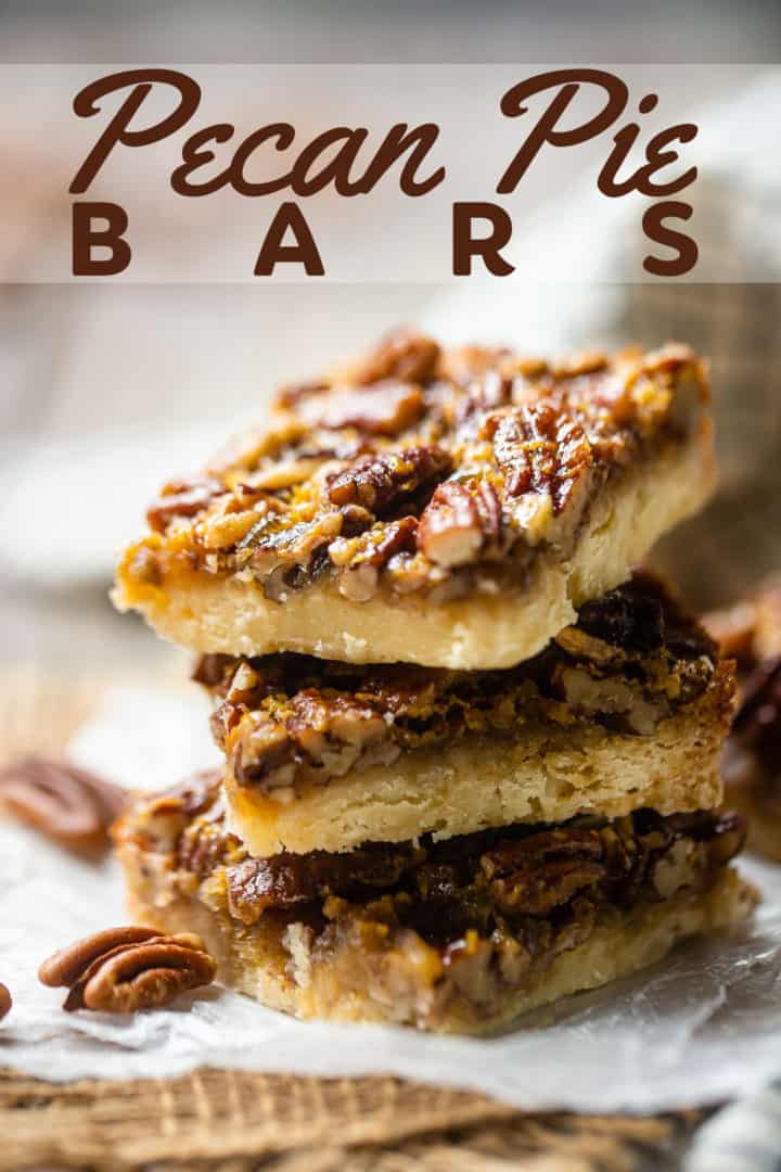 Pecan bars arranged in a stack, with a text overlay that reads "Pecan Pie Bars."