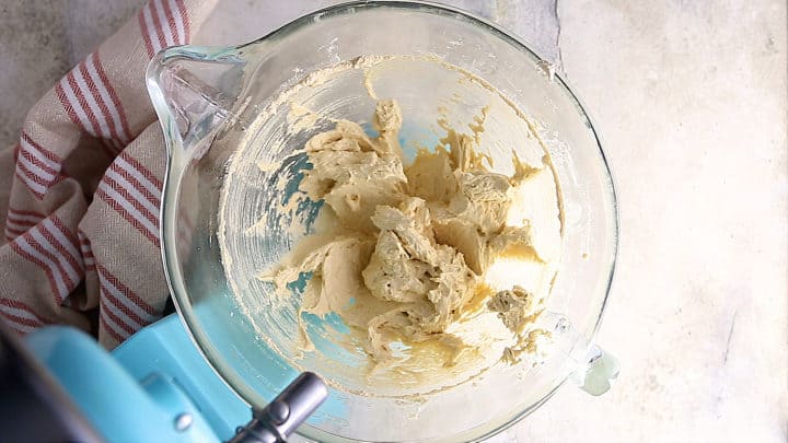 Eggs and vanilla mixed in to butter and sugar mixture.